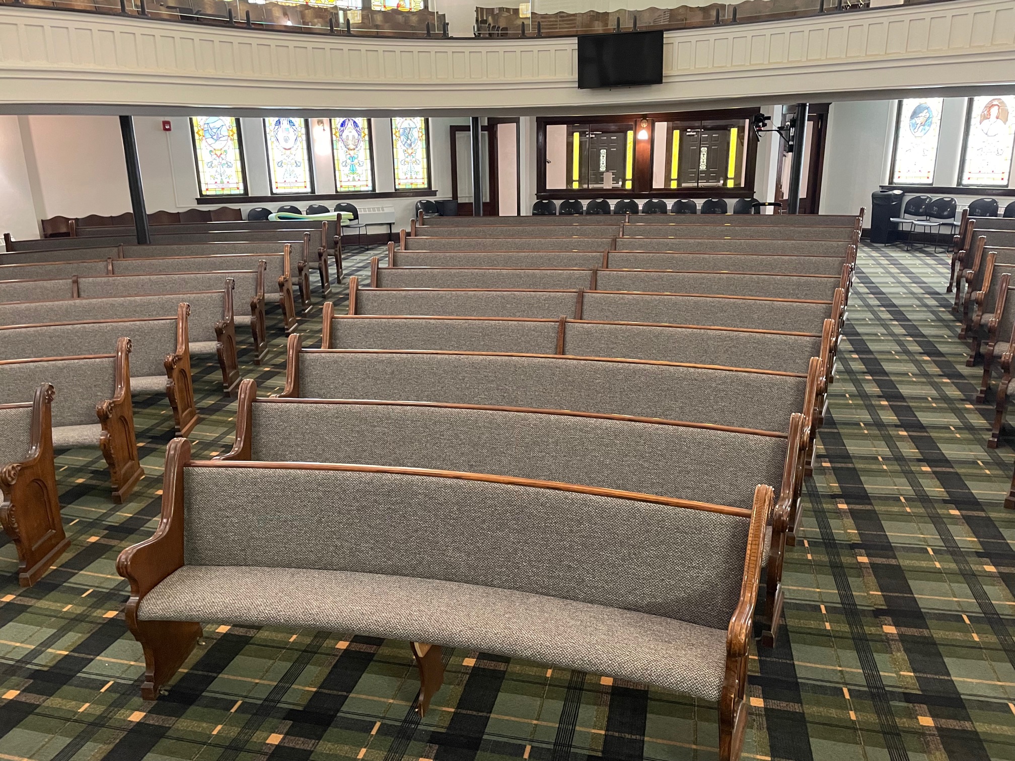 Pew Reupholstery job in Boise, Idaho by Woods Church Interiors